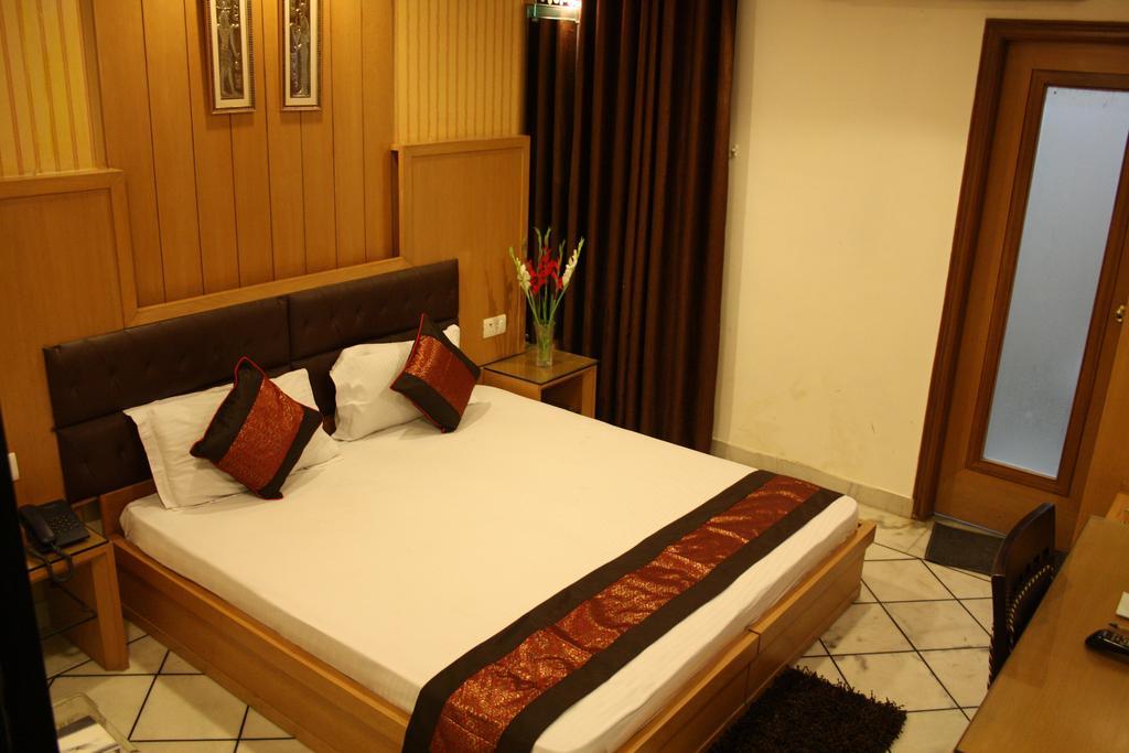 Hotel Apra Inn Új-Delhi Szoba fotó