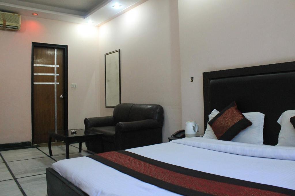 Hotel Apra Inn Új-Delhi Szoba fotó